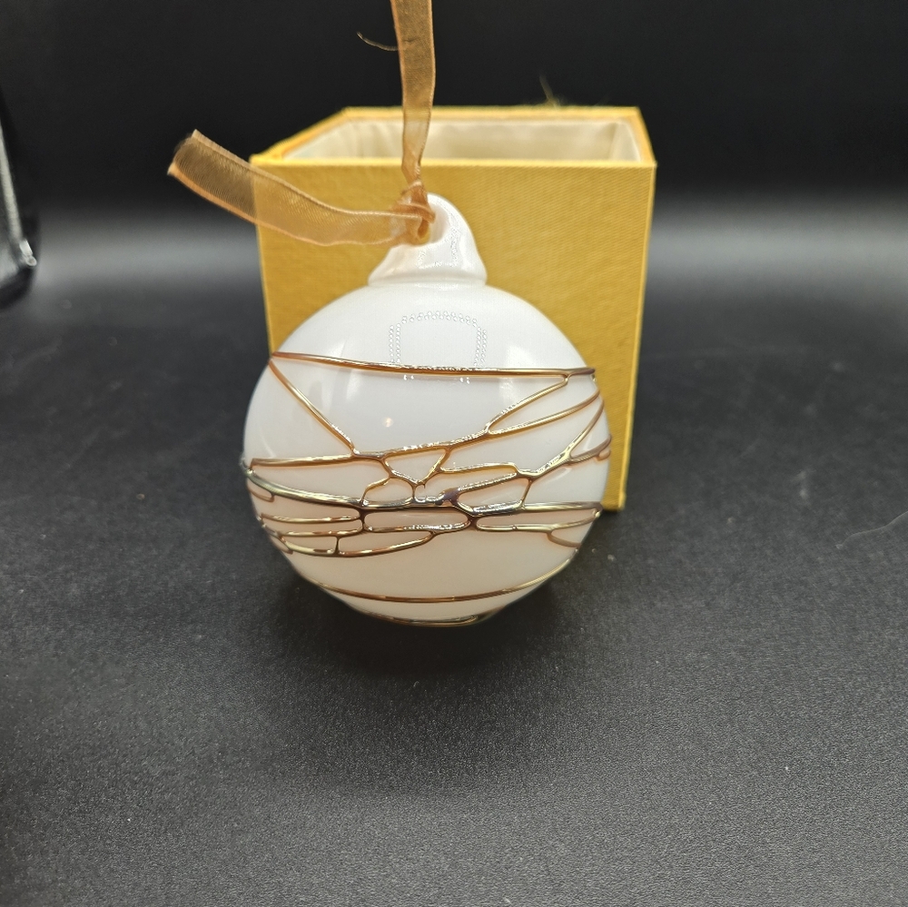 Christmas Ted Jolda Blown Glass Snowball Ornament.